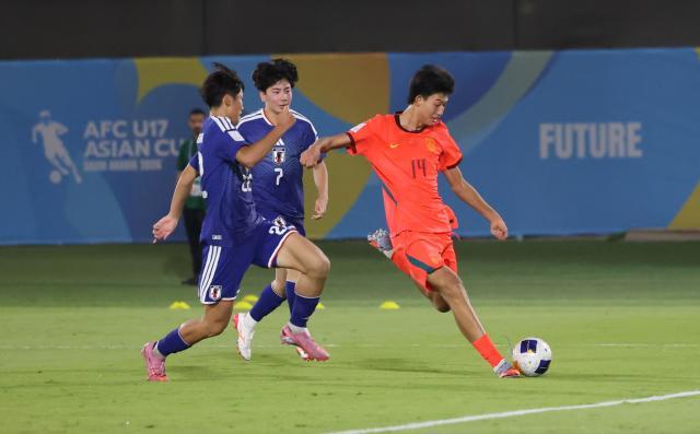 （体育）（1）足球——U17男足亚洲杯小组赛：中国队不敌日本队XxjpseC000070_20260510_PEPFN0A001.jpg